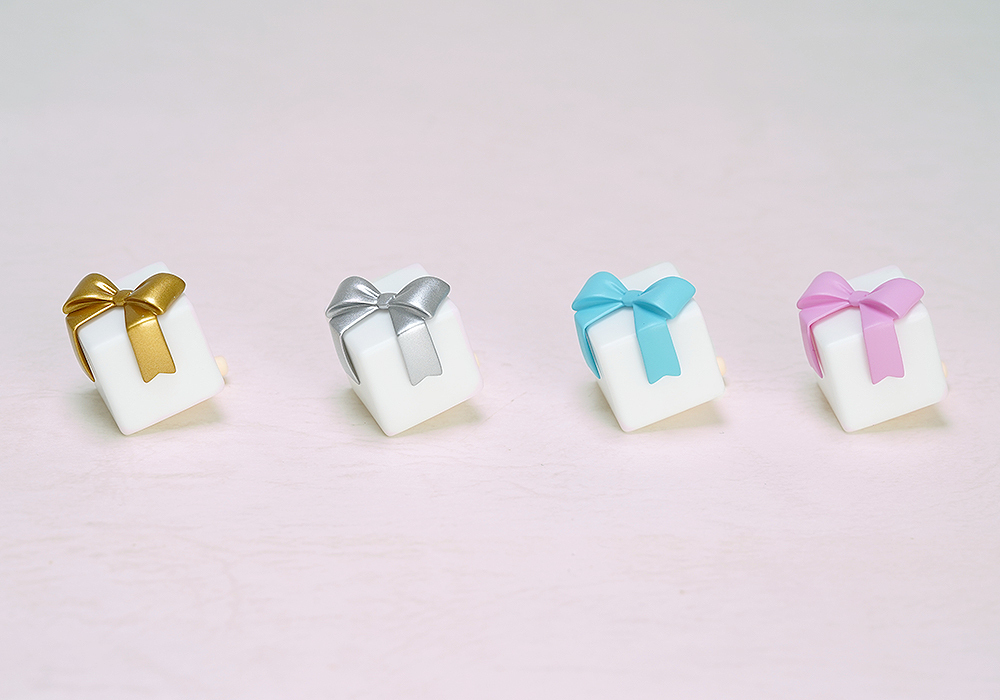 Four colourways (A–D) — gold, silver, blue and pink — sent at random